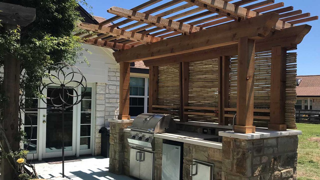 Outdoor kitchen with pergola