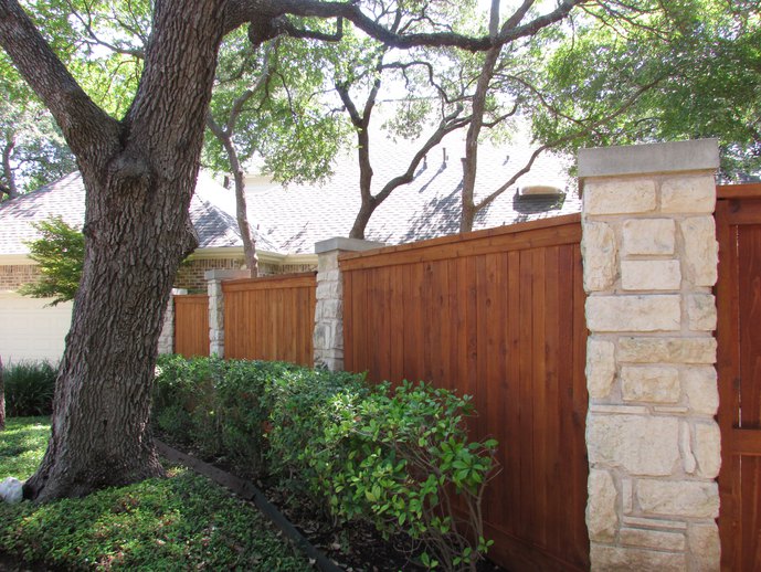 Wood and Rock Custom wood Fence